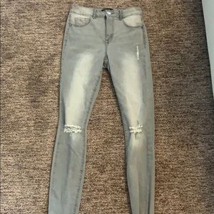 Gray distressed skinny jeans